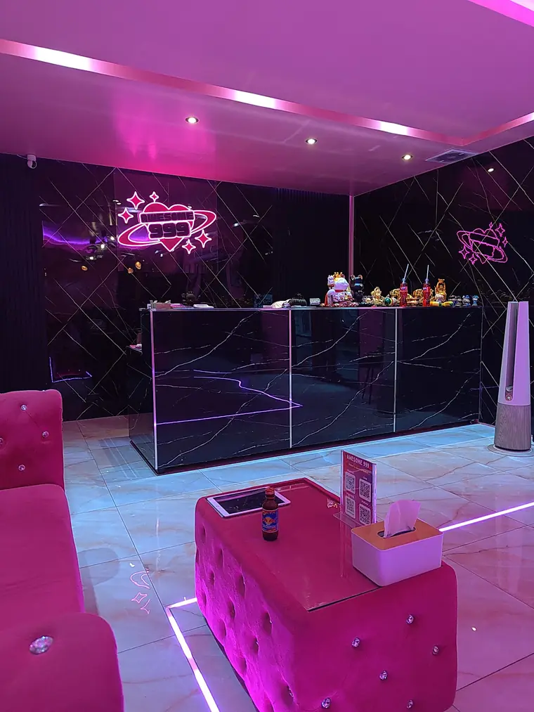 Photo: Google Maps via Google Maps Awesome999 Nuru Massage: reception with the neon logo