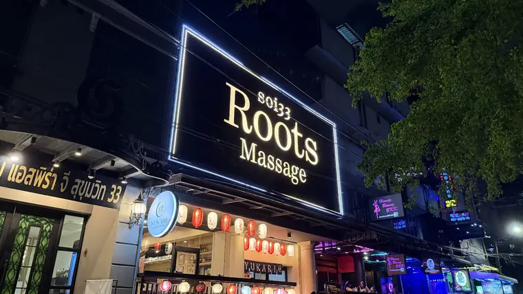 Photo: Google Maps via Google Maps Soi 33 Roots Massage: lit sign at night